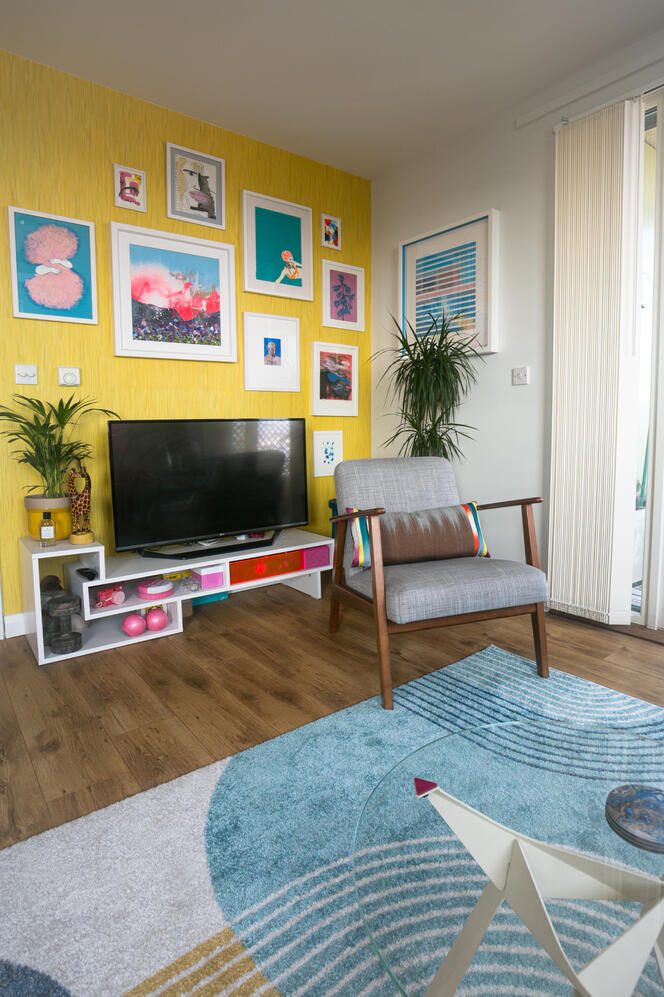 Bright living room corner, with TV and media unit